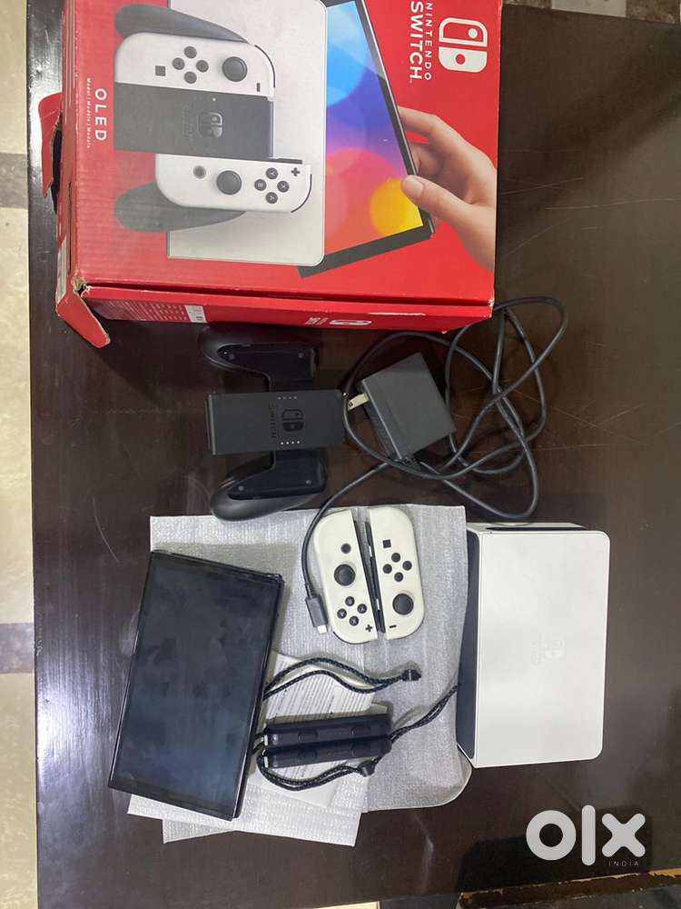 Nintendo Switch OLED (White Joy-Con) – Mint Condition, Barely Used!