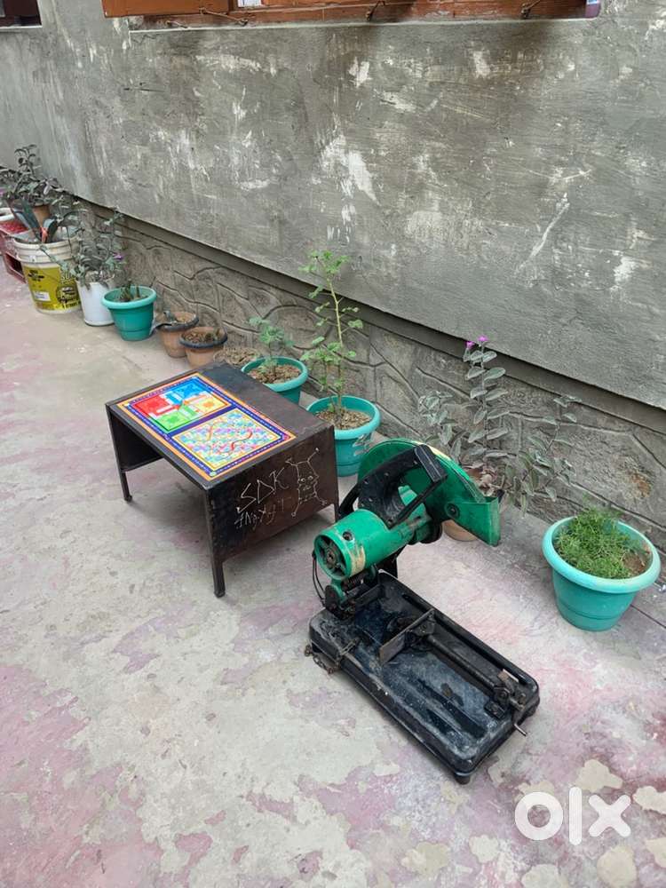 Grinder machine and study table