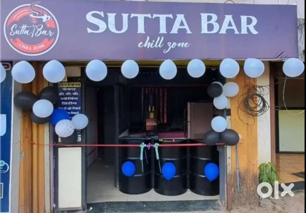 Shop name -sutta bar.      Smoking area