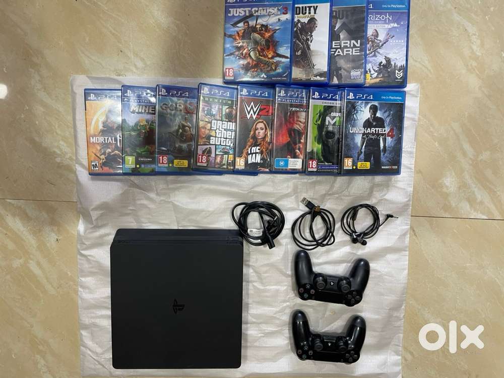 PS4 1tb two controller and, CD’s