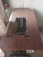 Swing machine table