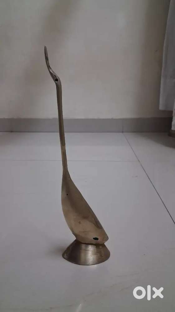 Old and antique Brass bird figurine