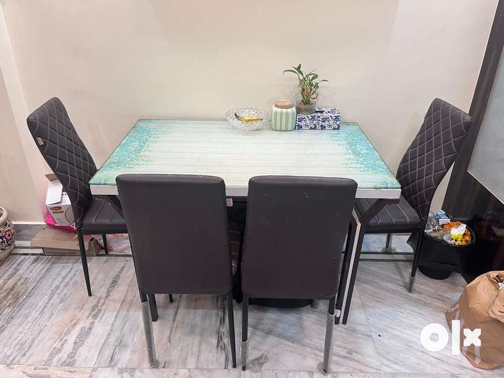 2-years old Dining table with4 chairs in great condition on sale