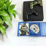 Sony PS4 Slim 1 TB in great condition | 2 Controllers + 2 Game discs
