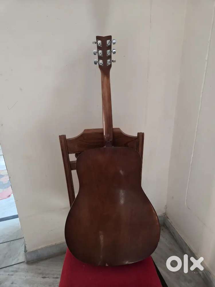 One year old guitar yamaha f310