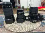 Nikon D3500 with 18-55, 50MM. 1.8, 70-300 lenses