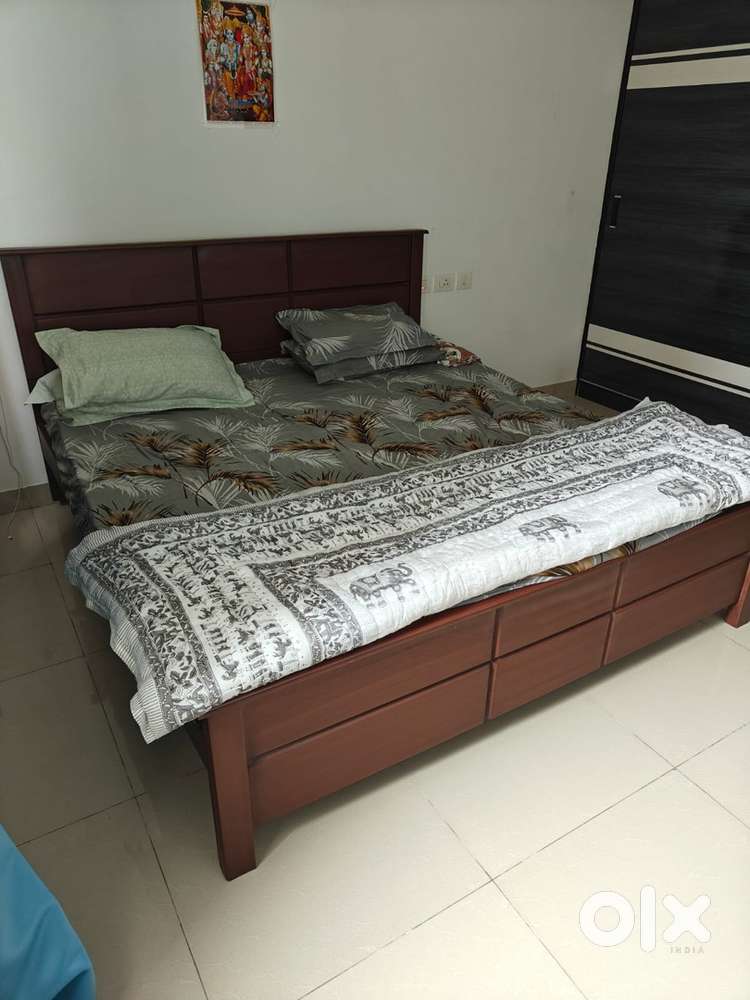 New King bed with godrej interio mattress and pillows for sale