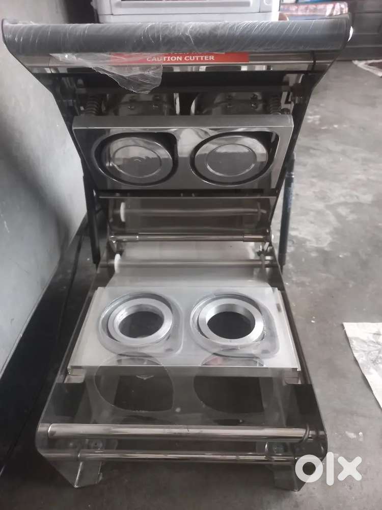 Cup sealing machine