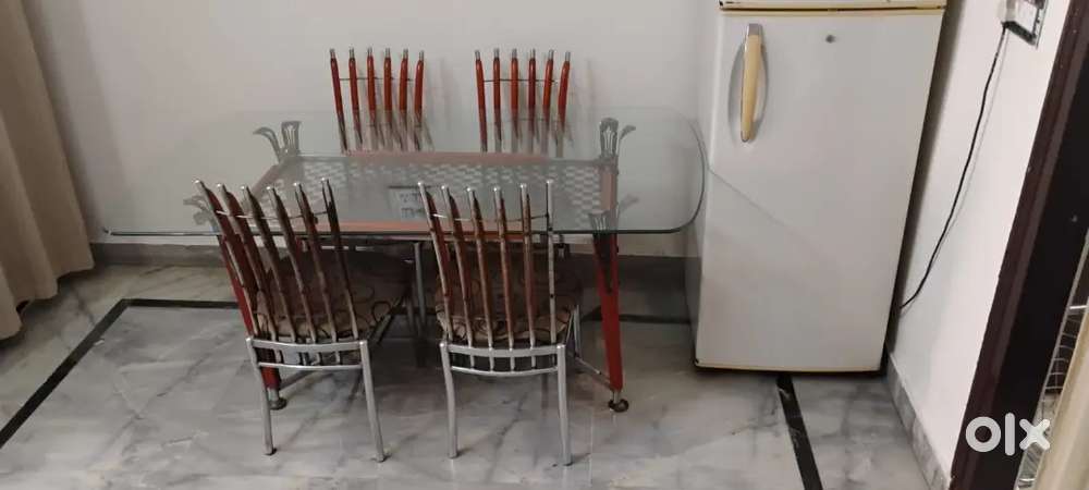 Glass-Top Dining Table