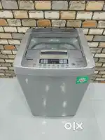 LG silver colour turbo drum 6.2kg top load fully automatic machine