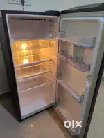 Fridge, Washing machine, Bed, Green Soul Chair, Table, Mattress