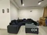 A fully furnished sharing room available for a girl in 91 sector