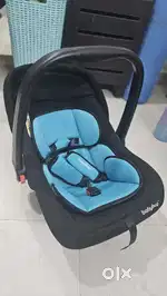 Selling Babyhug
Car Seat Cum Carry Cot  and R Rabbit Cuddle bag