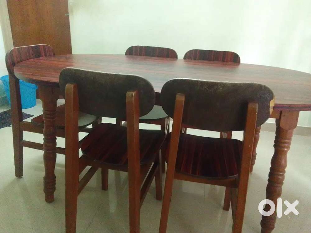 We are selling 3 seater sofa and wooden dining table