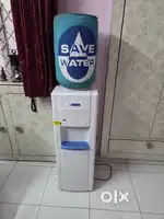 Water dispenser with hot, normal and cold water and fridge