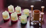 Eagle flasks with coffee mugs and glass stand,02 tea sets.