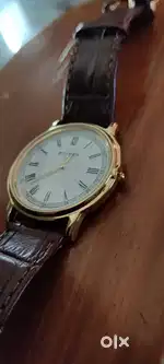 Titan gold & leather strap watch brand new