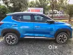 Nissan Magnite 1.0 ltr dual tone blue with black only 7000 km running.