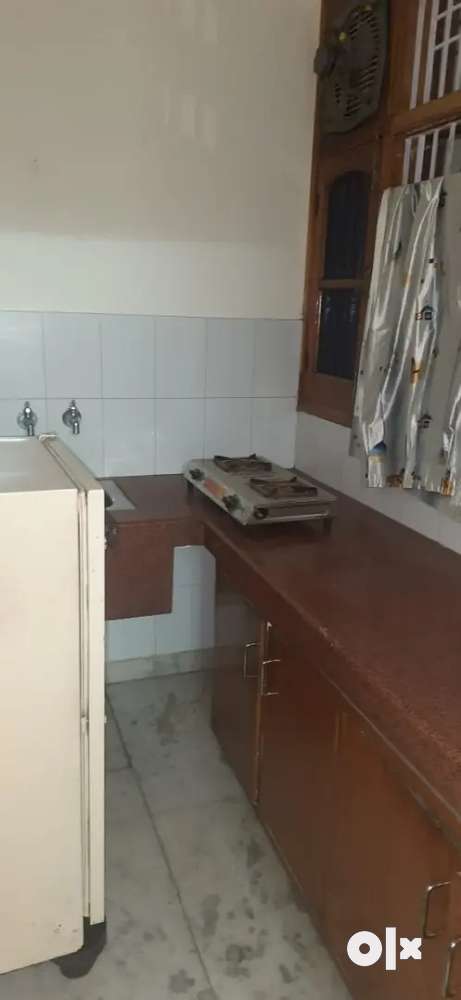 Independent fully furnished room with attached washroom and kichen.