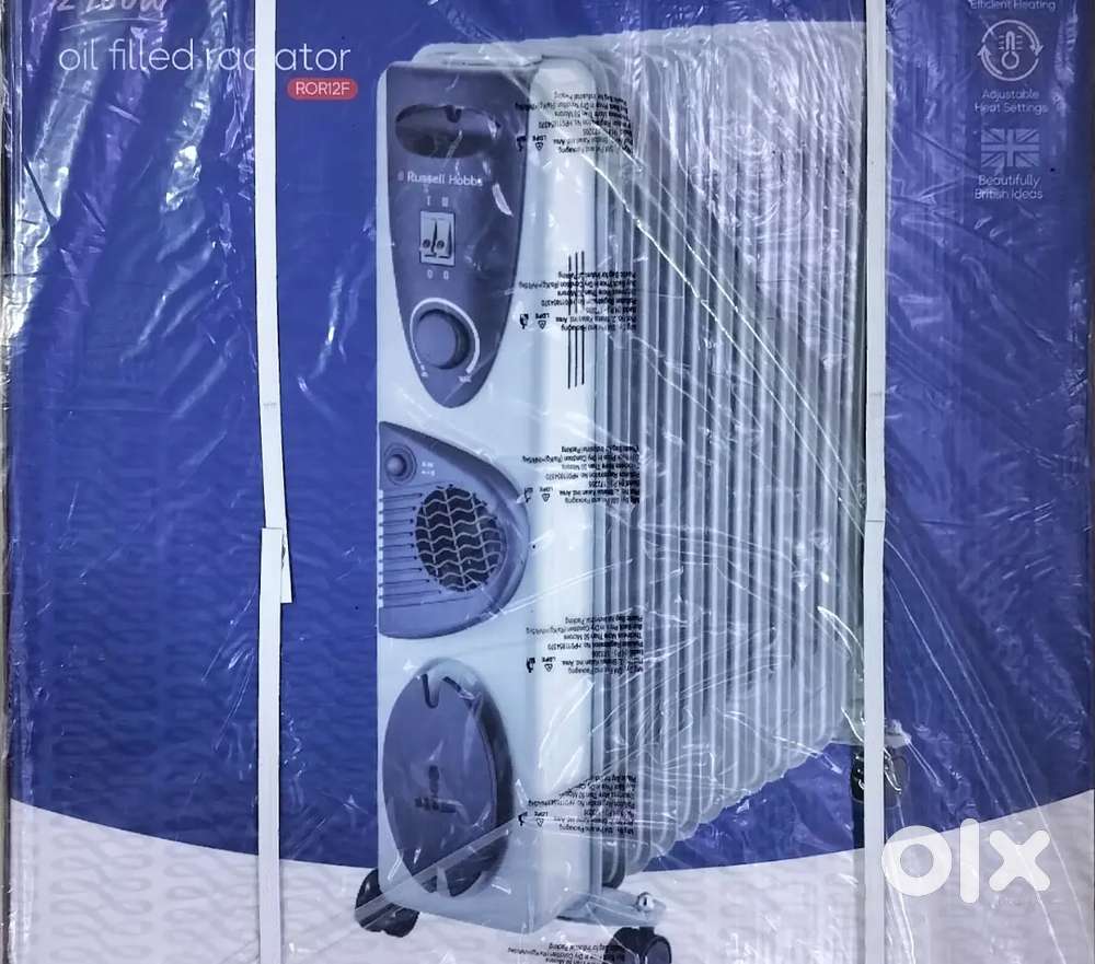 BRAND NEW Russell Hobbs 12-fin oil heater RadiatorSealed PackUnused