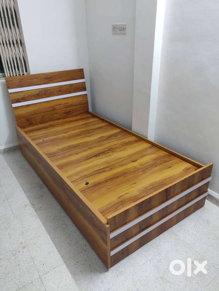 NEW SINGLE BED WITH TROLLEY STORAGE