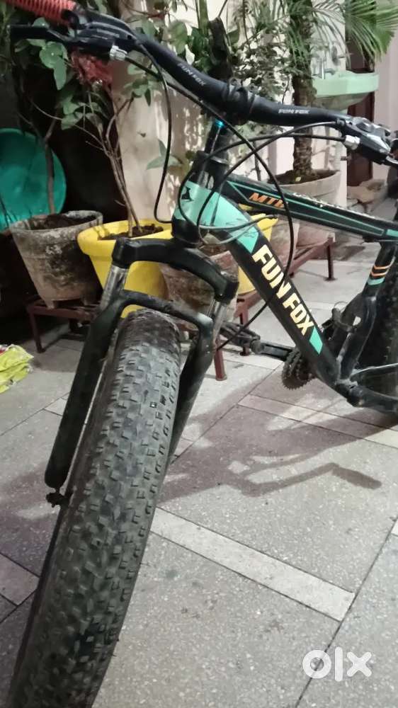 Mountain bikes for men with black and forest green boders