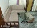 Wooden 7 seater sofa set wid two stools only 1 months old