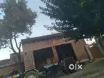 bhiga zameen hai on road par ghar bana hai