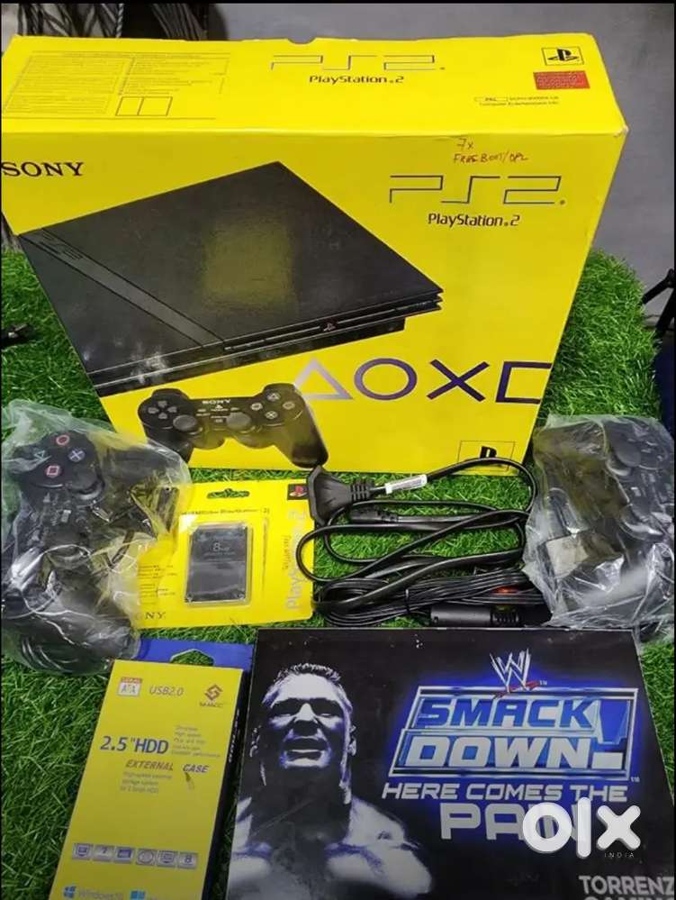 PS2 with 200games 2 controllers 1yr warranty