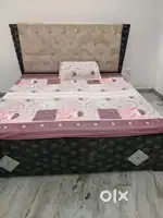 King size bed with a good quality of matresses and storage box as well