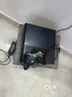 X-Box 360 with two controllers