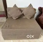 One seater foldable sofa-cum bed