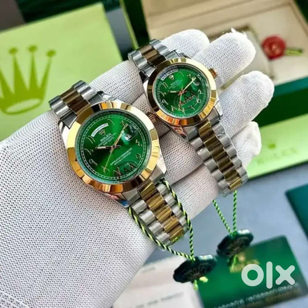 Rolex couple Arabic green dial watch