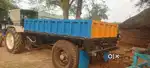 Tractor trali