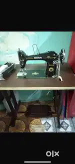 Sewing machine brand name boss