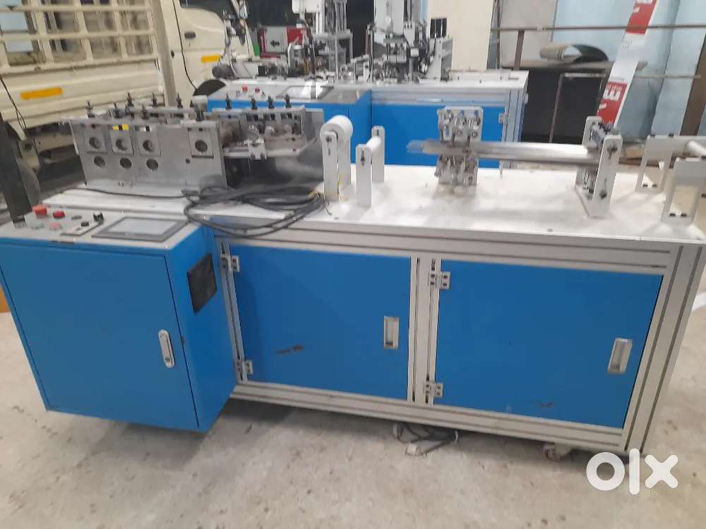 Mask manufacturing machine