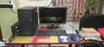 A computer equipped with a mouse and keyboard.