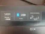 Sound bar with woofer
