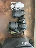 Nikon D5300 with 18-105mm lens and 70-300mm manual lens