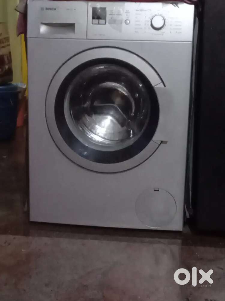 Washing machine bosch 7kg top load 1200rpm
