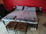 King size wrought iron double bed with side tables and matress