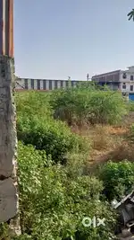 Plot 40x57 east facing 25 fit road par main highway AB road बेचना है ।