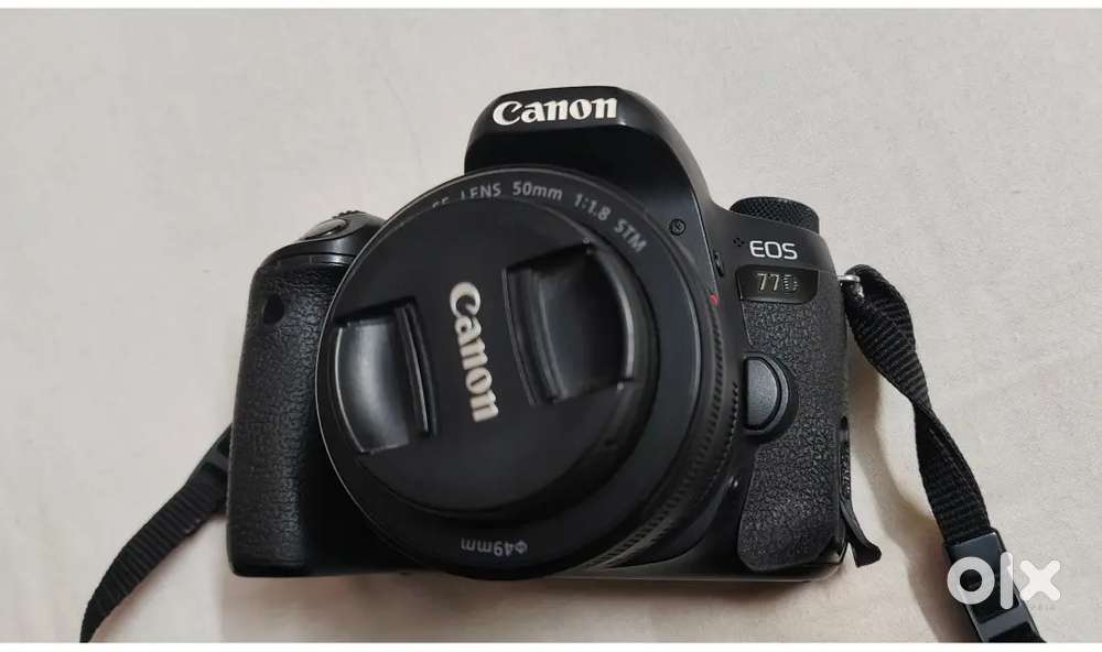 Canon 77d with 18-135mm, 50mm lens & Godox flash