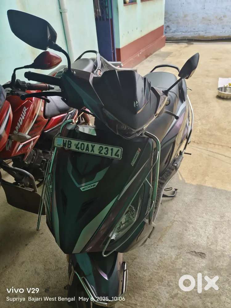 Best condition scooty not damaging part and new battery