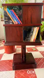 Antique rosewood revolving bookshelf or spice rack with sliding glass