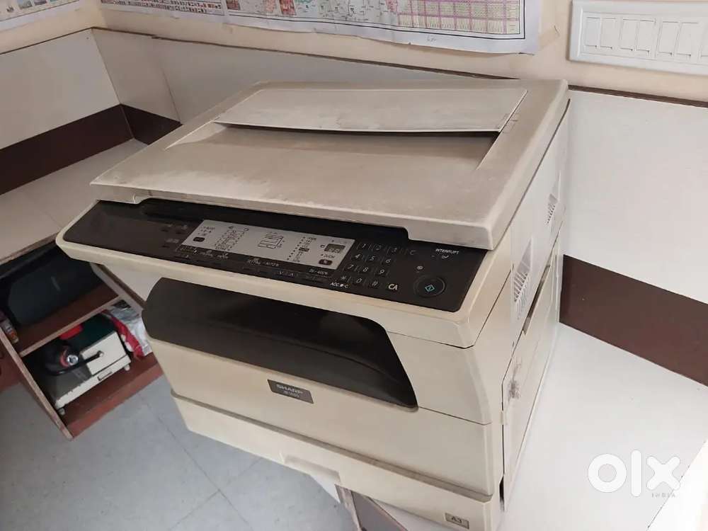 Cannon and sharp new condition photocopy color and printout machine