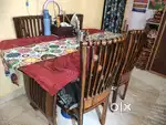 6 seater dining table,in good condition..glass top