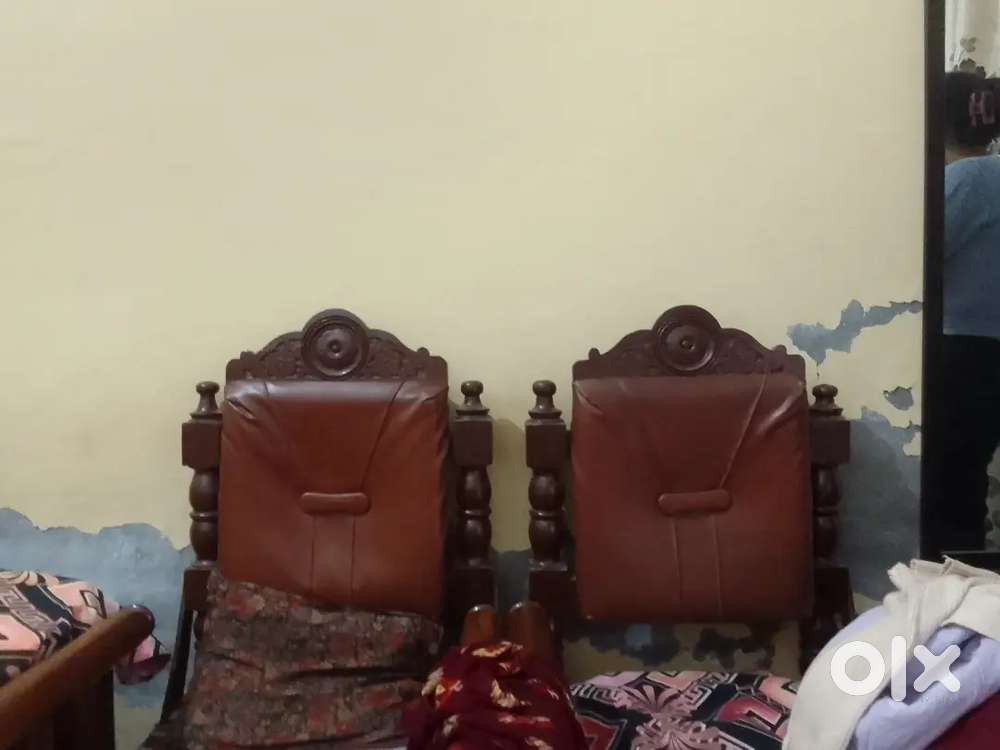 A Sofa set of brown colour.