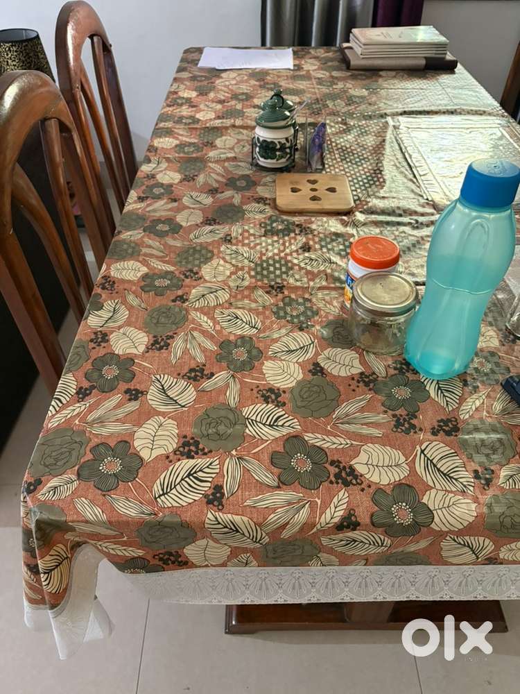 Six seater Dining table with Glass Top