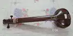 Tanpura with a hard box or case